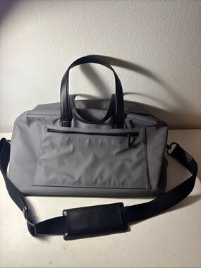 Away Gray Duffel Bag with Black Handles and Strap